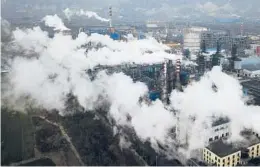  ?? SAM MCNEIL/AP 2019 ?? A study blames pollution for 9 million deaths a year with the toll attributed to dirty air from vehicles and industry. Above, a coal plant in China’s Shanxi province.