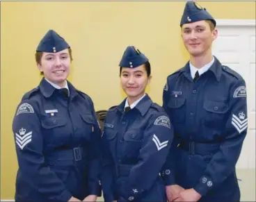  ?? BARB AGUIAR/Westside Weekly ?? Flight Sgt. Byllie Grover, Cpl. Maria Pham and Flight Sgt. Addison Behrish were brave enough to stand up and deliver during the 909 Peregrine Squadron's recent effective speaking competitio­n.