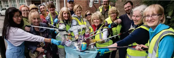  ??  ?? Getting stuck in: Armed with bags and litter grabbers, volunteers join the Mail’s Great Plastic Pick Up in Chingford, near London
