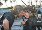  ?? Neal Preston Warner Bros. ?? DIRECTOR Bradley Cooper plays a musician helping a rising singer (Lady Gaga) in “A Star Is Born.”