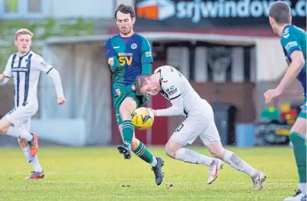  ??  ?? Ayr’s Joe Chalmers is on the end of an unorthodox challenge by Dunfermlin­e’s Declan Mcmanus