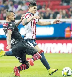  ?? FOTO: AFP ?? Chivas venció 2-0 a Xolos, el marcador lo abrió Alan Pulido.