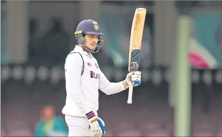  ?? GETTY IMAGES ?? Shubman Gill celebrates after reaching his half century on Day 2 of the third Test against Australia at the Sydney Cricket Ground on Friday.