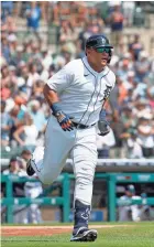  ?? RAJ MEHTA/USA TODAY SPORTS ?? Tigers designated hitter Miguel Cabrera runs to first base with a RBI single during the first inning against the Angels on Thursday in Detroit.