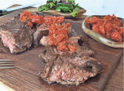  ?? JAN D'ATRI/SPECIAL FOR THE REPUBLIC ?? Spicy tomato chutney can be spooned over the top of the steak