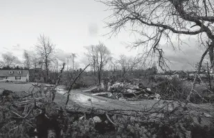  ?? Vasha Hunt / Associated Press ?? Storm damage is shown Thursday in Clanton, Ala. Storms rocked the Southeast, but no fatalities were reported. Possible tornadoes in Alabama knocked down trees and damaged homes.