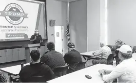  ?? Michelle L. Price / Associated Press ?? Chris Haskins, a regional field director for President Donald Trump’s re-election campaign, leads a “Stop the Madness” training in Las Vegas.