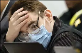  ?? MIKE STOCKER — SOUTH FLORIDA SUN-SENTINEL VIA AP, FILE ?? Marjory Stoneman Douglas High School shooter Nikolas Cruz listens to testimony while seated at the defense table during the penalty phase of his trial at the Broward County Courthouse, Friday, July 22, 2022, in Fort Lauderdale, Fla.