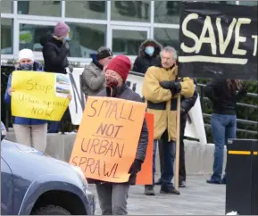  ?? MARK BRETT/Special to The Daily Courier ?? People protest a proposed developmen­t on the Naramata Bench. The project was rejected unanimousl­y by council.