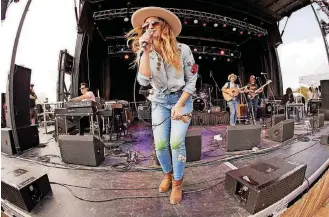  ?? [PHOTO BY NATHAN POPPE, THE OKLAHOMAN] ?? Margo Price performs live at Willie Nelson’s Spicewood Ranch in Texas.