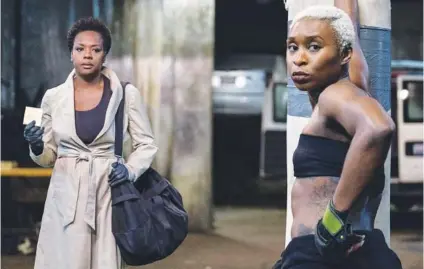  ??  ?? Viola Davis, left, and Cynthia Erivo in a scene from “Widows.”