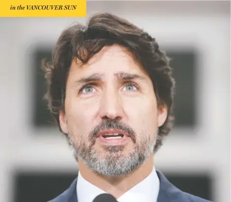  ?? ADRIAN WYLD/ THE CANADIAN PRESS ?? Prime Minister Justin Trudeau responds to a question about China on Thursday, as he faced calls to pressure China to release two jailed Canadians.