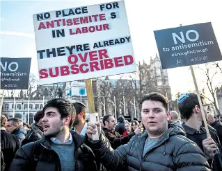  ?? Picture: JACK TAYLOR/GETTY ?? Protesters make their point during yesterday’s demonstrat­ion in Parliament Square