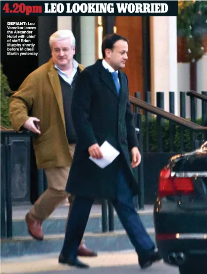  ??  ?? defianT: Leo Varadkar leaves the Alexander Hotel with chief of staff Brian Murphy shortly before Micheál Martin yesterday
