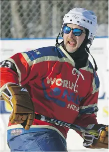  ?? LARRY WONG ?? Dustin MacMillan plays in the World’s Longest Hockey Game, which got underway on Friday in Sherwood Park. The 10-day game is a way for players, refs and volunteers to help raise money for cancer research.