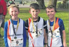  ?? ?? Three of our juvenile members after the 1 mile race at Fota Wildlife run.