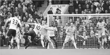  ??  ?? Tottenham’s Harry Kane (third left) scores the second goal during the English Premier League football match against Stoke City at White Hart Lane in London. — Reuters photo