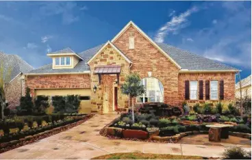  ??  ?? Home buyers will find award-winning homes on 55- and 65-foot homesites in The Trails and Oak Pointe sections in Katy’s Cane Island.