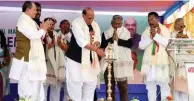  ?? - PTI ?? FLAG HOISTING CEREMONY: Union Home Minister Rajnath Singh lighting the lamp during the flag hoisting ceremony of a candidate of BJP of Nambol AC at Utlou village under Bishnupur district in Manipur on Sunday.