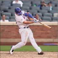  ?? Seth Wenig / Associated Press ?? New York Mets’ Pete Alonso hits a walk-off home run during the seventh inning of the second game of the team’s doublehead­er against the Washington Nationals on Thursday in New York. The Mets won 5-4.