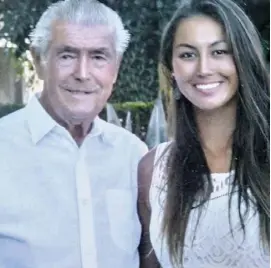  ??  ?? Ray with daughter Natasha, a golf profession­al, at his 90th birthday celebratio­n