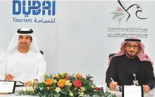  ??  ?? Major General Mohammad Al Merri and Saeed Al Merri during the agreement signing ceremony.