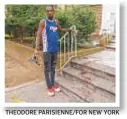  ?? THEODORE PARISIENNE/FOR NEW YORK ?? The son of one of the gun victims stands next to blood on the steps of their building in Flatbush.