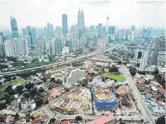 ??  ?? Moving into 2019, analysts hope to see improvemen­t in jobs secured by listed companies, banking on the re-tendering of Klang Valley Double Track works, public hospital works, monorail to Putrajaya, potential infrastruc­ture spending by the Sarawak government, and full rollout of Pan Borneo Sabah. — Bernama photo