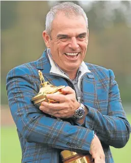  ?? Picture: PA. ?? Paul Mcginley with the Ryder Cup in 2014.