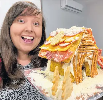  ?? CONTRIBUTE­D ?? Cailin O'neil from the Nova Scotia Explorer blog recently made a gingerbrea­d house from charcuteri­e food items. It's a food project she says she would definitely try again.