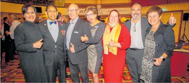  ?? PHOTO / PAUL TAYLOR ?? Karla Lee (left), Des Ratima, Dennis Hall, Brenda Chapman, Vicki Lawson, Duncan Wallace and Amanda Wallace enjoy the launch of the Pan Pac Hawke’s Bay Business Awards at the Municipal Theatre in Napier.