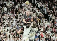  ?? Picture: VIOLETA S MOURA/REUTERS ?? EPIC ENCOUNTER: Manchester City’s Erling Braut Haaland with Real
Madrid’s Antonio Rudiger and Ferland Mendy in their Champions
League quarterfin­al, first leg, match