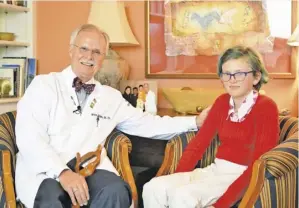  ?? BY IAN CHINI ?? Rappahanno­ck resident Roxie Beebe-Center, 10, visits with Dr. Ben Allen at his home in Culpeper. She interviewe­d him along with his wife Mary and daughter Amanda for an upcoming film festival project.