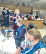  ?? Northeast Colorado Health Department/ Courtesy photo ?? Volunteers shown helping with the on-site COVID-19 vaccinatio­n clinic held March 5 and 6 at Cargill Protein in Fort Morgan include Laura Bacon, Sherri Yahn, Christine Covelli, Conner Gerken, Jody Kind and Trish McClain.