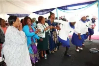  ?? ?? Women sing and dance celebratin­g the appointmen­t of First Lady Dr Auxillia Mnangagwa as the patron for Agricultur­e-for -She at Zimbabwe House yesterday