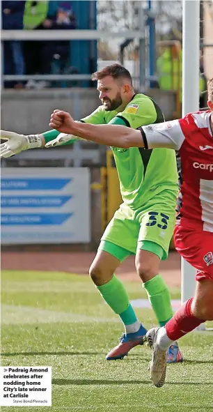  ?? Steve Bond/Pinnacle ?? > Padraig Amond celebrates after nodding home City’s late winner at Carlisle