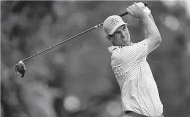  ?? Eric Christian Smith / Contributo­r ?? Steven Alker hits his tee shot on the 18th hole during the second round of the Insperity Invitation­al at The Woodlands Country Club on Saturday. Alker followed an opening 67 with a second-round 66.