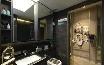  ?? SAMUEL ISAAC CHUA/THE EDGE SINGAPORE ?? Master bathroom comes with LED lightbox, designed like a skylight with three different lighting modes