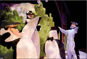  ??  ?? Penguins populate the stage during the Arkansas Arts Center’s Children’s Theatre production of
The Gingerbrea­d Man.