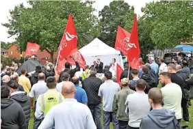  ?? ?? Workers gathered during a protest at plans to close the site in Erdington