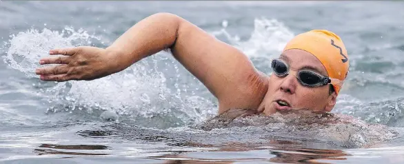  ?? DARREN STONE/TIMES COLONIST ?? Open-water ultra-marathon swimmer Susan Simmons, shown at Ogden Point in Victoria, will attempt two massive swims this summer.