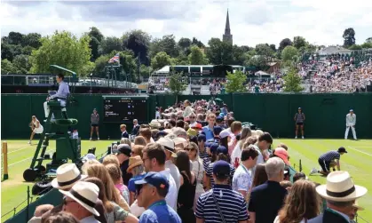  ?? Photograph: Simon Stacpoole/Offside/Getty Images ?? ‘The huge crowds at the jubilee, at Glastonbur­y and now at Wimbledon (above) show that, for many, life has returned to normal.’