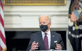  ?? AL DRAGO / NYTNS ?? President Joe Biden speaks during a roundtable discussion on the American Rescue Plan in the State Dining Room of the White House on Friday.
