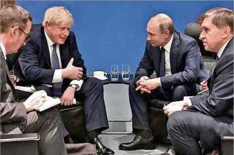  ?? ?? ENCUENTRO. El exprimer ministro británico, Boris Johnson reunido con el presidente ruso, Vladimir Putin en Berlín, Alemania, en enero de 2020.