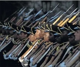  ?? PHOTO: ROGER BOSCH/REUTERS ?? The guard of honour guard ahead of President Jacob Zuma’s State of the Nation Address to a joint sitting of the National Assembly and National Council of Provinces.