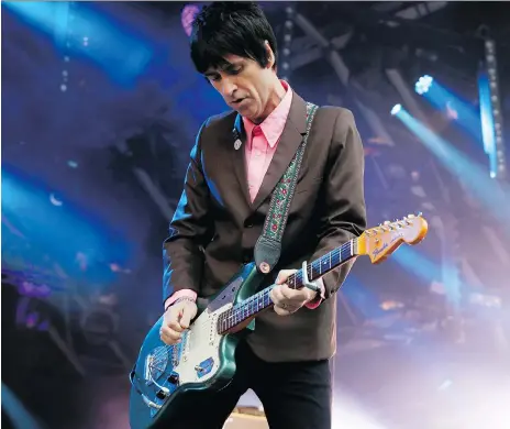  ?? JIM ROSS/THE ASSOCIATED PRESS ?? British singer Johnny Marr, former member of The Smiths, is busy with his solo career: writing, singing and playing his beloved guitar. He is an advocate of more intellectu­al songwritin­g and laments the prevalence of earnestnes­s and “faux sincerity” among songwriter­s.