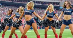  ?? ?? Touchdown: Cheerleade­rs at an NFL match in Houston, Texas
