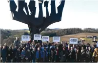  ?? (Larry Luxner) ?? DOZENS PARTICIPAT­E in a memorial ceremony at Mauthausen, the Nazi concentrat­ion camp that held nearly 200,000 prisoners during the Holocaust, on Sunday.