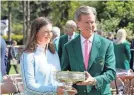  ?? MICHAEL MADRID/USA TODAY SPORTS ?? Club chairman Fred Ridley flanks Lottie Woad, who won the Augusta National Women’s Amateur on Sunday.