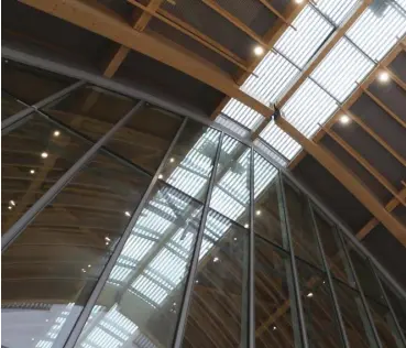  ??  ?? Terminal 2’s high ceiling and wide glass facade allow natural sunlight to illuminate the airport interior. The three-layer glass wall system also reflects off heat, keeping the terminal cool even in daytime.